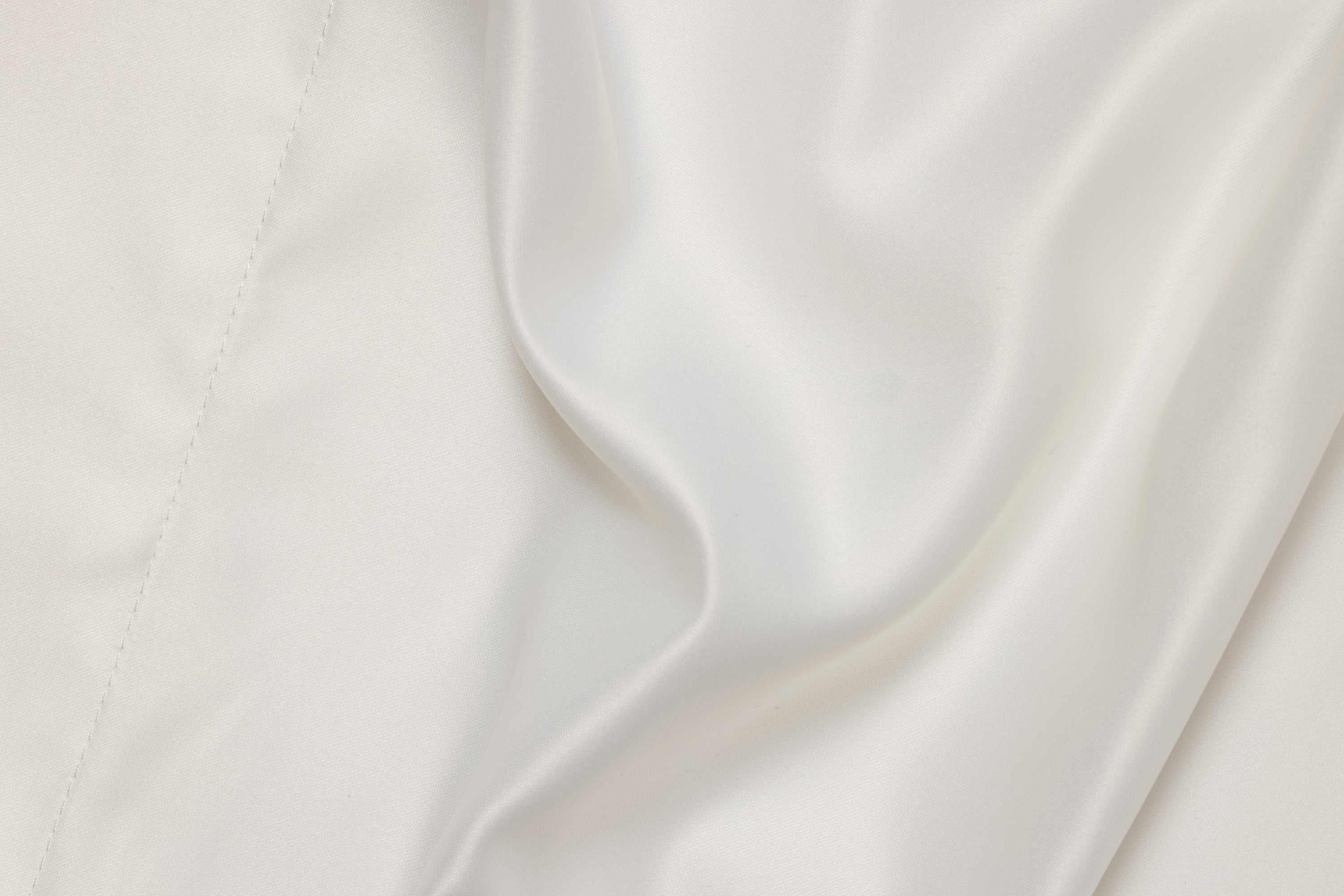 'White Russian' Luxe Satin Pillowcase. Anti-aging, machine washable, with the bonus secret pocket.